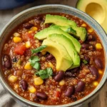 one pot vegan quinoa chili with beans, corn, and avocado